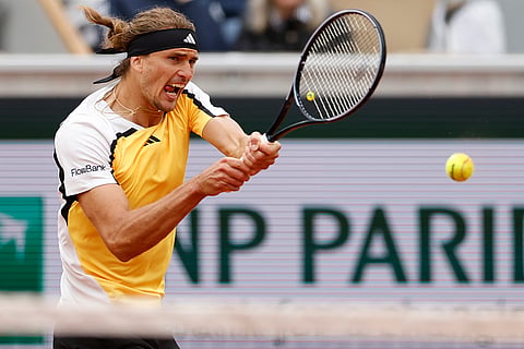 Alexander Zverev plays a shot against David Goffin